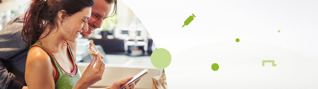 man and women looking at a smart phone