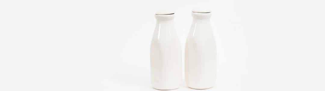 White milk bottles with a white background 