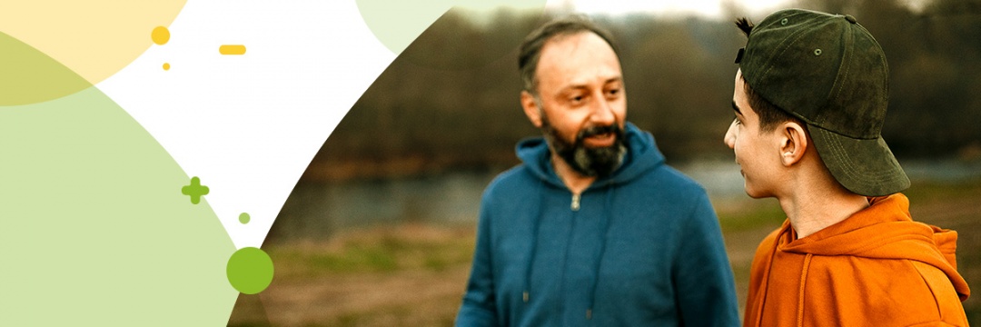 Man and teenager talking to each other