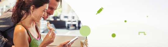 man and women looking at a smart phone