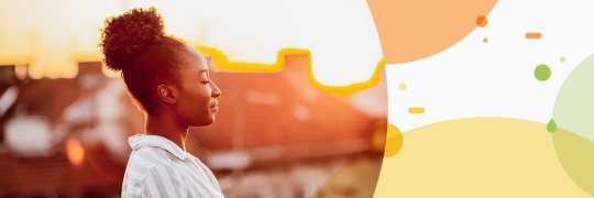 Portrait of black women with white shirt and pony tail